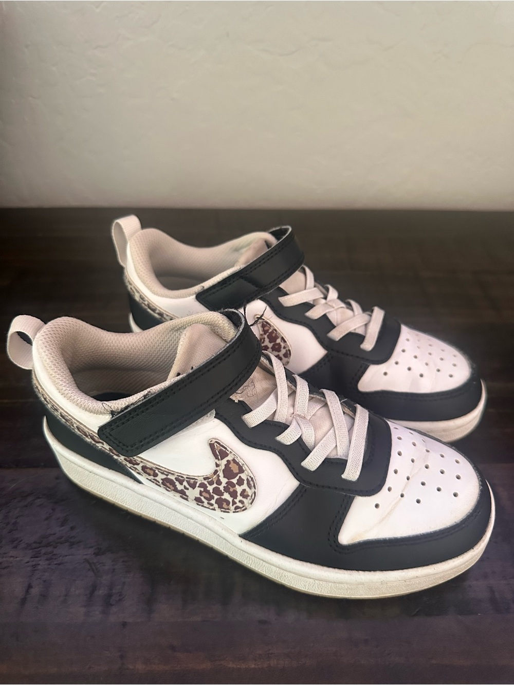 Nike Kids Black and White Sneakers with Leopard Swoosh